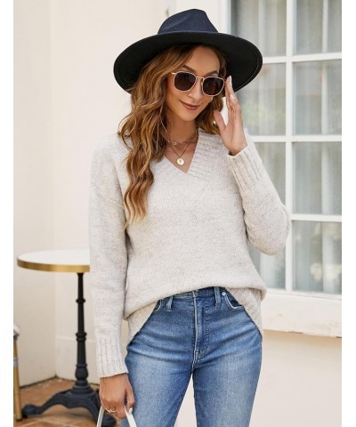 Women Casual Long Sleeve Sweaters Soft Loose Fit Cable Knit Pullover V Neck Oversized Tunic Sweater Tops Light Apricot $23.39...