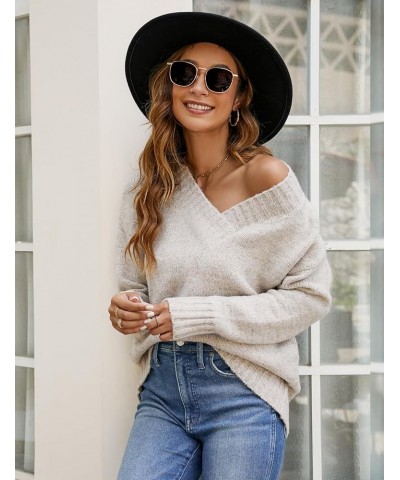 Women Casual Long Sleeve Sweaters Soft Loose Fit Cable Knit Pullover V Neck Oversized Tunic Sweater Tops Light Apricot $23.39...