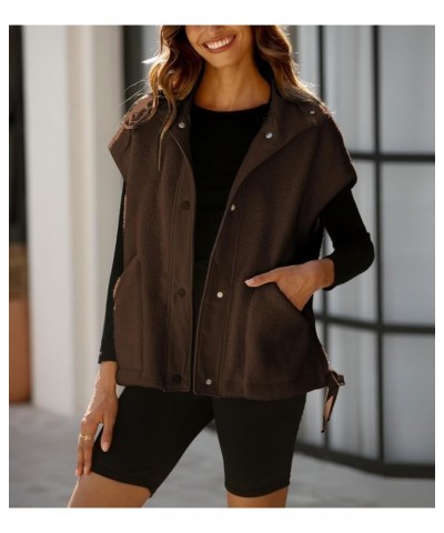 Women's Oversized Fleece Vest Casual Sleeveless Fuzzy Sherpa Jacket Winter Warm Button Down Outerwear with Pockets Brown $23....