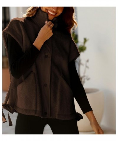 Women's Oversized Fleece Vest Casual Sleeveless Fuzzy Sherpa Jacket Winter Warm Button Down Outerwear with Pockets Brown $23....