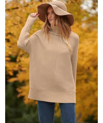 Womens 2023 Trendy Sweaters Oversized Turtleneck Long Batwing Sleeve Split Hem Pullover Knit Sweater Tops Deep Apricot $26.31...