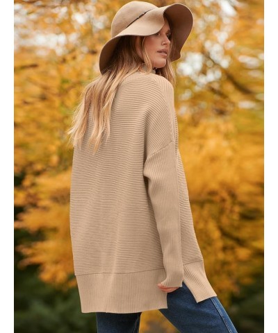 Womens 2023 Trendy Sweaters Oversized Turtleneck Long Batwing Sleeve Split Hem Pullover Knit Sweater Tops Deep Apricot $26.31...