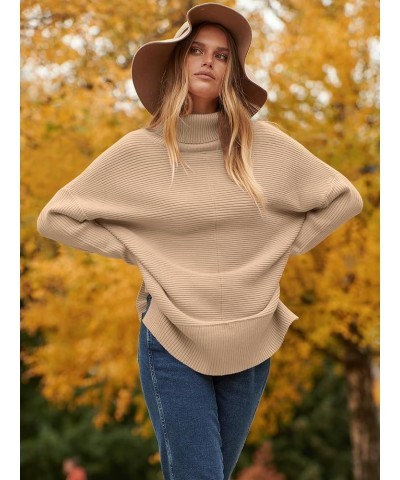 Womens 2023 Trendy Sweaters Oversized Turtleneck Long Batwing Sleeve Split Hem Pullover Knit Sweater Tops Deep Apricot $26.31...